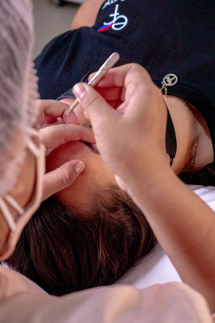 Henna brow tint being applied